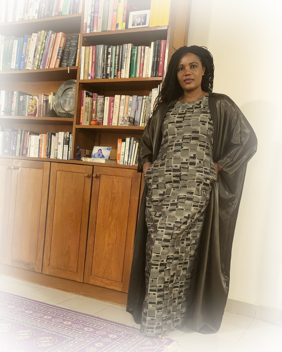 Kadine Reynolds in a colleague's personal library in Thies, Senegal